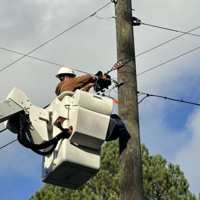 Another worker in bucket truck